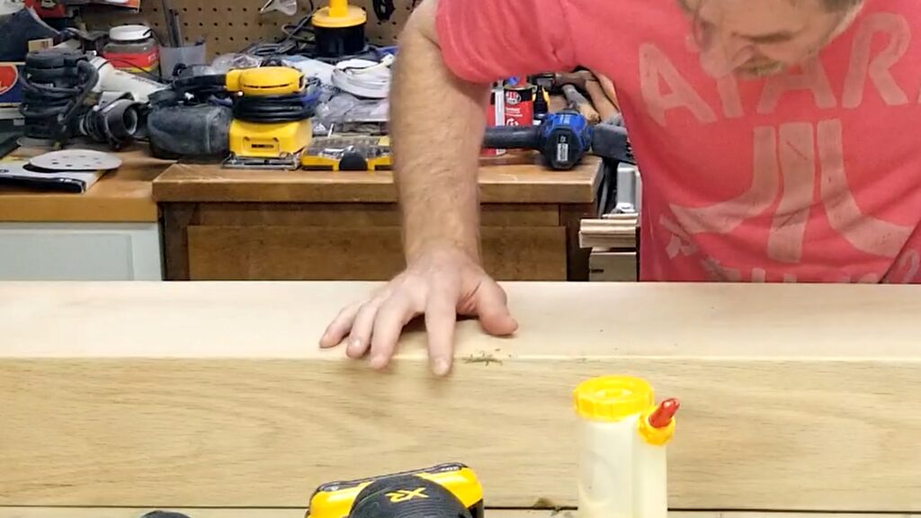 filling bad joint cracks with a glue and sawdust mixture