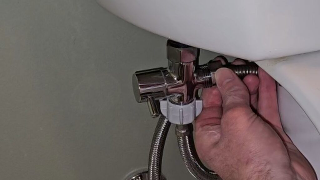 attach spray hose to t-valve